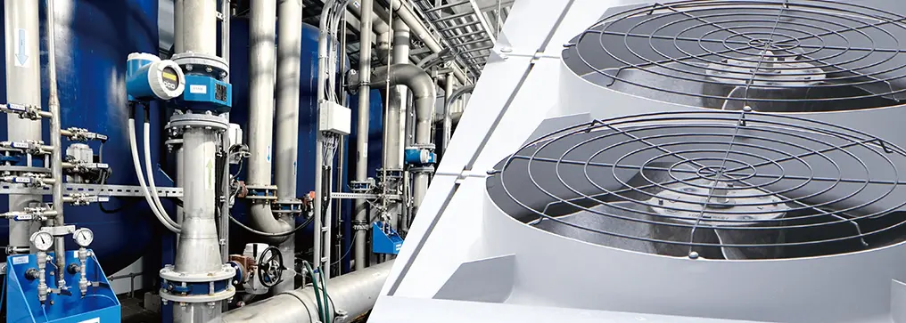 ファンやポンプの設備で FRENIC-Mini を使用している様子を示す画像。省エネ運転や制御安定化をイメージ。